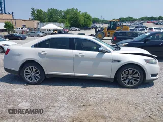 2015 Ford Taurus Limited with VIN 1FAHP2F88FG171835, listed as a IAAI auction lot 42370656 with 152,210 mi miles and . Bid and sale history available at DreamBid. Image 13.
