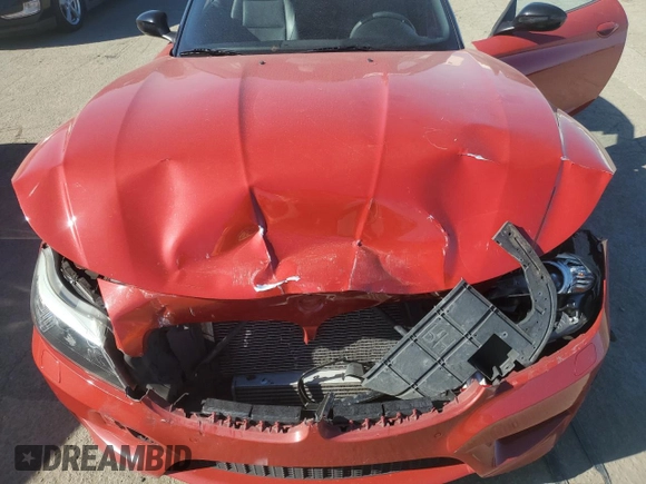 2012 BMW Z4 sDrive35is with VIN WBALM1C58CE633610, listed as a Copart auction lot 42824955 with 84,901 mi miles and Salvage title. Bid and sale history available at DreamBid. Image 11.