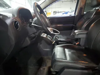2017 Jeep Compass High Altitude with VIN 1C4NJDEB0HD169962, listed as a Copart auction lot 43227405 with 144,912 mi miles and Salvage Title. Bid and sale history available at carsss.com. Image 7.