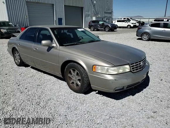 2000 Cadillac Seville Touring STS z VIN 1G6KY5498YU255607, wystawiony jako Copart lot #71130714 z przebiegiem 146 046 mil mil oraz Szkoda całkowita • Salvage title. Historia ofert i sprzedaży dostępna na DreamBid. Obrazek 11.