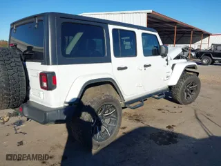 2019 Jeep Wrangler Unlimited Sahara with VIN 1C4HJXEN1KW687924, listed as a IAAI auction lot 41082030 with 65,852 mi miles. Bid and sale history available at carsss.com. Image 4.