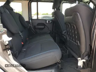 2023 Jeep Wrangler Rubicon z VIN 1C4JJXR65PW557849, wystawiony jako Copart lot #57845705 z przebiegiem 21 849 mil mil oraz Szkoda całkowita • Salvage title. Historia ofert i sprzedaży dostępna na DreamBid. Obrazek 10.