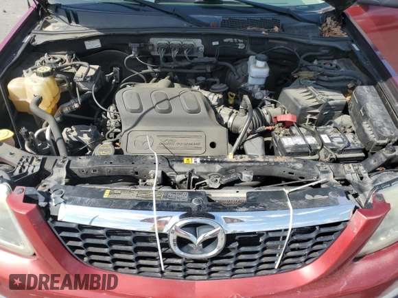 2008 Mazda Tribute Touring with VIN 4F2CZ96108KM14483, listed as a Copart auction lot 55091955 with 133,397 mi miles and Salvage Title. Bid and sale history available at DreamBid. Image 12.
