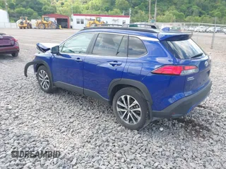 2024 Toyota Corolla Cross XLE with VIN 7MUDAABG8RV106100, listed as a IAAI auction lot 42220089 with 8,181 mi miles and . Bid and sale history available at DreamBid. Image 3.