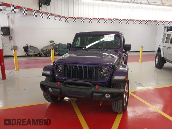 2023 Jeep Wrangler High Altitude z VIN 1C4HJXEN9PW560958, wystawiony jako IAAI lot #42393559 z przebiegiem 35 981 mil mil oraz . Historia ofert i sprzedaży dostępna na DreamBid. Obrazek 6.