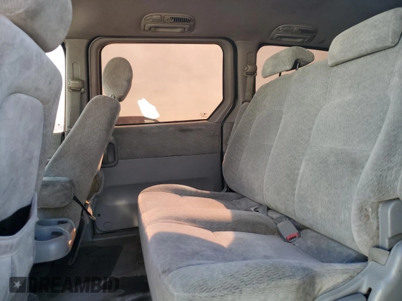 2004 Kia Sedona LX with VIN KNDUP131746573472, listed as a Copart auction lot 80593594 with 187,905 mi miles and Clean Title. Bid and sale history available at carsss.com. Image 11.