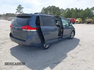 2014 Toyota Sienna LE AAS with VIN 5TDKK3DCXES498110, listed as a IAAI auction lot 41847116 with 242,065 mi miles and . Bid and sale history available at DreamBid. Image 4.