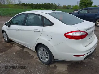 2015 Ford Fiesta S z VIN 3FADP4AJ2FM189449, wystawiony jako IAAI lot #42242667 z przebiegiem 107 570 mil mil oraz . Historia ofert i sprzedaży dostępna na DreamBid. Obrazek 3.