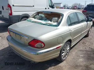 2008 Jaguar X-Type z VIN SAJWA51A28WJ37186, wystawiony jako IAAI lot #42107511 z przebiegiem 157 524 mil mil oraz . Historia ofert i sprzedaży dostępna na DreamBid. Obrazek 6.