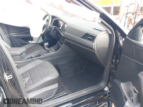 2023 Volkswagen Jetta SE z VIN 3VW7M7BU1PM039129, wystawiony jako IAAI lot #41905547 z przebiegiem 20 188 mil mil oraz . Historia ofert i sprzedaży dostępna na DreamBid. Obrazek 5.