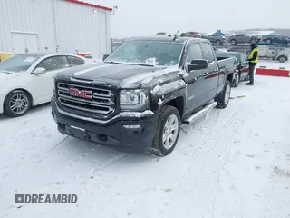 2016 GMC Sierra 1500 with VIN 1GTV2LEC7GZ384286, listed as a IAAI auction lot 41602529 with 106,626 mi miles and . Bid and sale history available at carsss.com. Image 2.