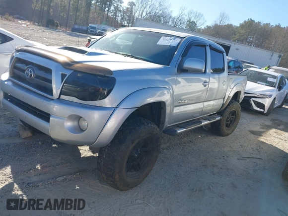 2009 Toyota Tacoma z VIN 5TELU42N09Z596810, wystawiony jako IAAI lot #41673552 z przebiegiem 169 044 mil mil oraz . Historia ofert i sprzedaży dostępna na DreamBid. Obrazek 2.