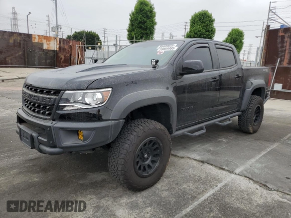2021 Chevrolet Colorado 4WD ZR2 with VIN 1GCGTEEN3M1293299, listed as a Copart auction lot 59809995 with 21,890 mi miles and Salvage title. Bid and sale history available at DreamBid. Image 1.