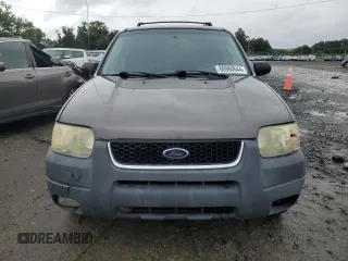 2003 Ford Escape XLT Popular 2 with VIN 1FMYU93163KE03257, listed as a Copart auction lot 66966644 with 209,618 mi miles and Salvage Title. Bid and sale history available at carsss.com. Image 5.