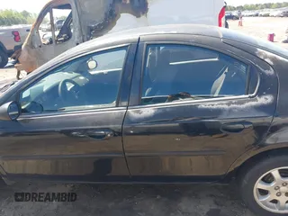 2005 Dodge Neon SXT with VIN 1B3ES56C85D143830, listed as a IAAI auction lot 41990483 with 205,947 mi miles. Bid and sale history available at carsss.com. Image 14.