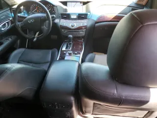 2015 Infiniti Q70 z VIN JN1BY1AR4FM562282, wystawiony jako Copart lot #48322155 z przebiegiem 98 645 mil mil oraz Szkoda całkowita • Salvage title. Historia ofert i sprzedaży dostępna na DreamBid. Obrazek 8.
