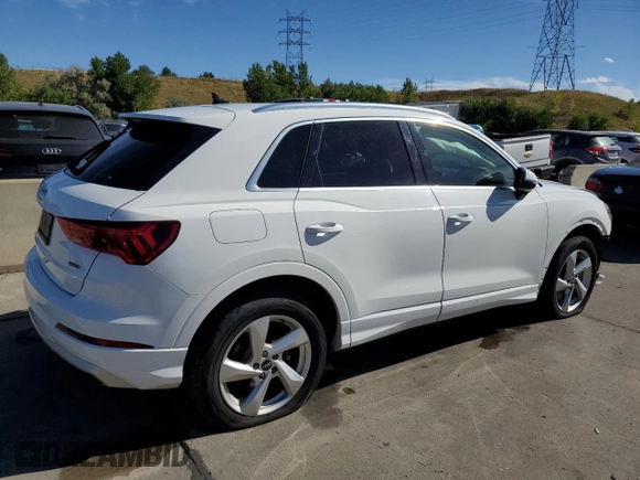 2021 Audi Q3 Premium z VIN WA1AUCF38M1067676, wystawiony jako Copart lot #71621704 z przebiegiem 77 395 mil mil oraz Szkoda całkowita • Salvage title. Historia ofert i sprzedaży dostępna na DreamBid. Obrazek 3.