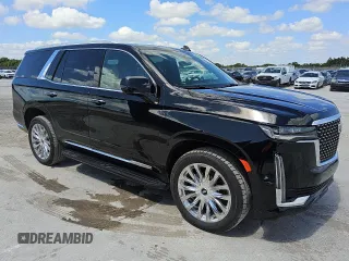 2023 Cadillac Escalade 4WD Premium Luxury z VIN 1GYS4BKL7PR332923, wystawiony jako Copart lot #57442025 z przebiegiem 56 886 mil mil oraz Tytuł czysty. Historia ofert i sprzedaży dostępna na DreamBid. Obrazek 4.