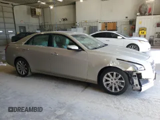 2014 Cadillac CTS Luxury AWD with VIN 1G6AX5S38E0130350, listed as a Copart auction lot 56565825 with 167,699 mi miles and Salvage title. Bid and sale history available at DreamBid. Image 4.