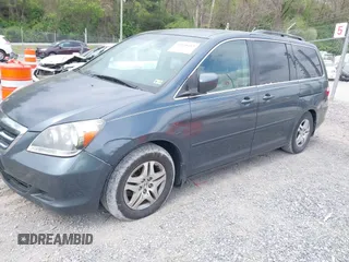 2005 Honda Odyssey EX with VIN 5FNRL38495B004614, listed as a IAAI auction lot 42128185 with 230,247 mi miles. Bid and sale history available at carsss.com. Image 2.