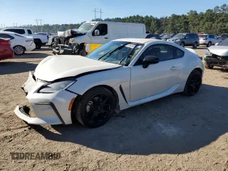2023 Toyota GR86 Premium with VIN JF1ZNBE10P9762875, listed as a Copart auction lot 73985624 with 10,593 mi miles and Salvage Title. Bid and sale history available at carsss.com. Image 1.
