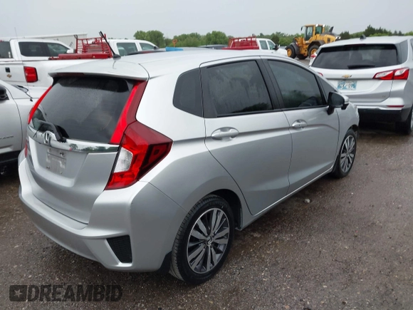 2016 Honda Fit EX with VIN JHMGK5H77GX022973, listed as a IAAI auction lot 42087380 with 96,439 mi miles and . Bid and sale history available at DreamBid. Image 4.
