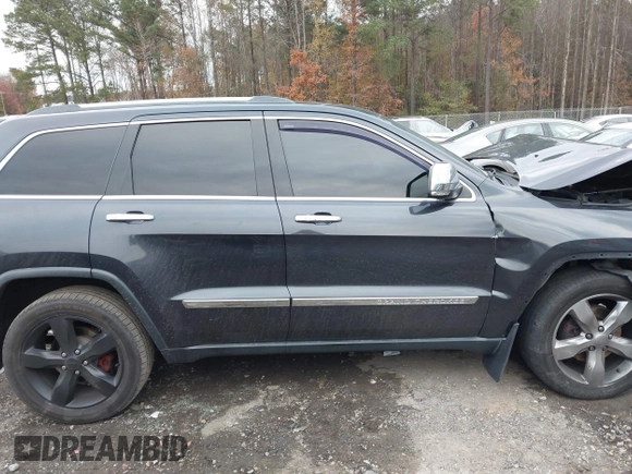 2012 Jeep Grand Cherokee Overland with VIN 1C4RJECT7CC334116, listed as a IAAI auction lot 40968071 with 98,794 mi miles. Bid and sale history available at carsss.com. Image 13.