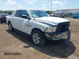 2014 Ram 1500 Big Horn with VIN 1C6RR7LT5ES346575, listed as a IAAI auction lot 42554655 with 171,811 mi miles and . Bid and sale history available at DreamBid. Image 1.