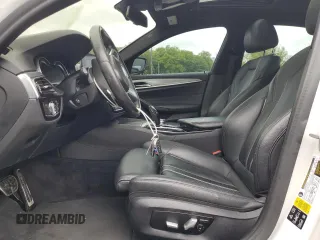 2019 BMW 5 Series 540i xDrive with VIN WBAJE7C58KWW37088, listed as a Copart auction lot 57759905 with 64,621 mi miles and Salvage title. Bid and sale history available at DreamBid. Image 7.