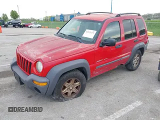 2003 Jeep Liberty Sport with VIN 1J4GL48K03W608325, listed as a IAAI auction lot 42033270 with 210,609 mi miles. Bid and sale history available at carsss.com. Image 2.