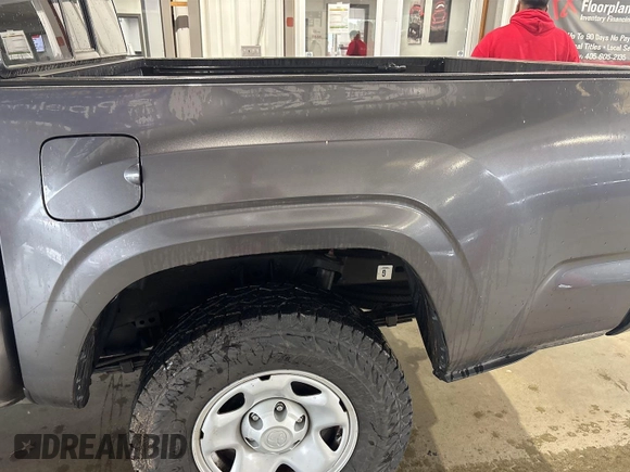 2021 Toyota Tacoma SR z VIN 5TFCZ5AN2MX279975, wystawiony jako IAAI lot #42477503 z przebiegiem 50 690 mil mil oraz . Historia ofert i sprzedaży dostępna na DreamBid. Obrazek 31.
