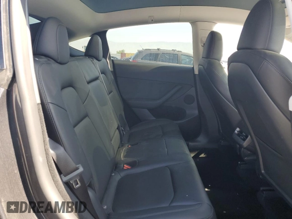 2024 Tesla Model Y Long Range z VIN 7SAYGDEE3RF121102, wystawiony jako Copart lot #60548895 z przebiegiem 13 336 mil mil oraz Szkoda całkowita • Salvage title. Historia ofert i sprzedaży dostępna na DreamBid. Obrazek 10.