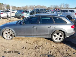 2014 Audi allroad Premium with VIN WA1TFAFL2EA068850, listed as a IAAI auction lot 41640053 with 168,660 mi miles. Bid and sale history available at carsss.com. Image 14.