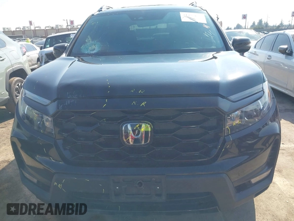 2023 Honda Passport Elite z VIN 5FNYF8H01PB005725, wystawiony jako IAAI lot #41457435 z przebiegiem 39 562 mil mil oraz . Historia ofert i sprzedaży dostępna na DreamBid. Obrazek 12.