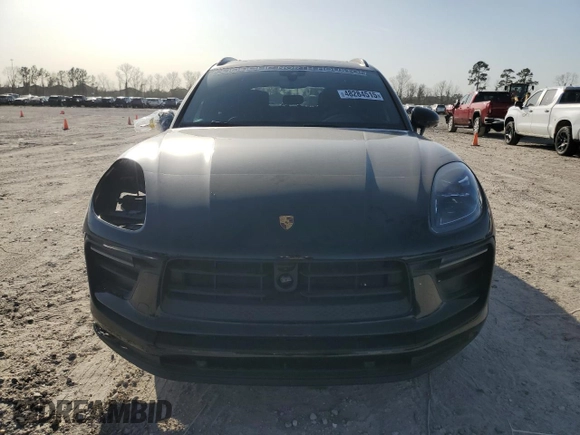 2025 Porsche Macan with VIN WP1AA2A55SLB00084, listed as a Copart auction lot 48284515 with 2,997 mi miles and Salvage title. Bid and sale history available at DreamBid. Image 5.
