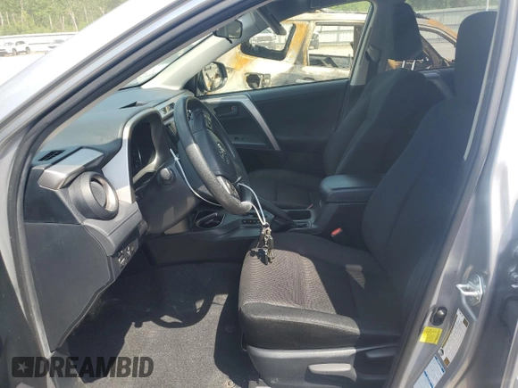 2018 Toyota RAV4 LE with VIN JTMBFREV3JJ236153, listed as a Copart auction lot 62642325 with 70,261 mi miles and Salvage title. Bid and sale history available at DreamBid. Image 7.