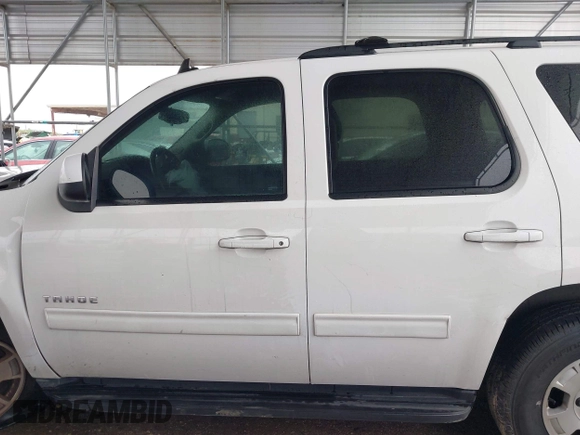 2013 Chevrolet Tahoe LS with VIN 1GNSCAE05DR276326, listed as a IAAI auction lot 41894489 with 173,183 mi miles and . Bid and sale history available at DreamBid. Image 15.