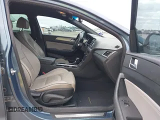 2015 Hyundai Sonata Sport with VIN 5NPE34AB5FH163825, listed as a IAAI auction lot 42013743 with Not Provided miles and . Bid and sale history available at carsss.com. Image 5.