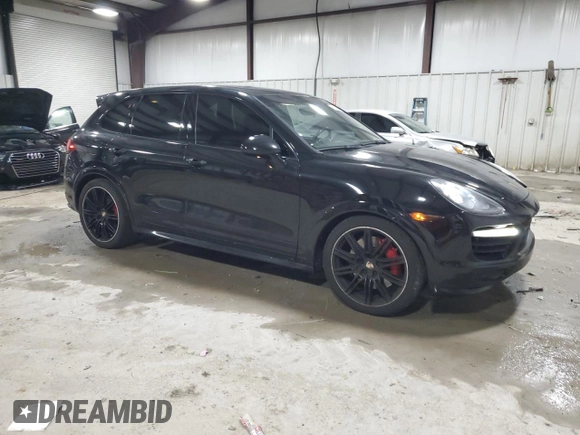 2012 Porsche Cayenne Turbo z VIN WP1AC2A21CLA84144, wystawiony jako Copart lot #82688294 z przebiegiem 124 143 mil mil oraz Szkoda całkowita • Salvage title. Historia ofert i sprzedaży dostępna na DreamBid. Obrazek 4.