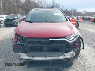 2020 Honda CR-V Touring with VIN 2HKRW2H90LH649017, listed as a IAAI auction lot 41701827 with 50,565 mi miles and . Bid and sale history available at DreamBid. Image 12.