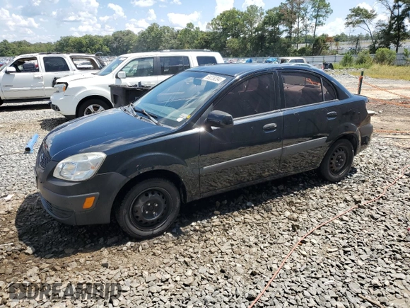 2009 Kia Rio LX with VIN KNADE223296539006, listed as a Copart auction lot 69229394 with 227,766 mi miles and Salvage Title. Bid and sale history available at DreamBid. Image 1.