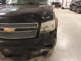 2012 Chevrolet Tahoe LTZ with VIN 1GNSKCE02CR297261, listed as a IAAI auction lot 40255137 with 283,110 mi miles and . Bid and sale history available at DreamBid. Image 6.