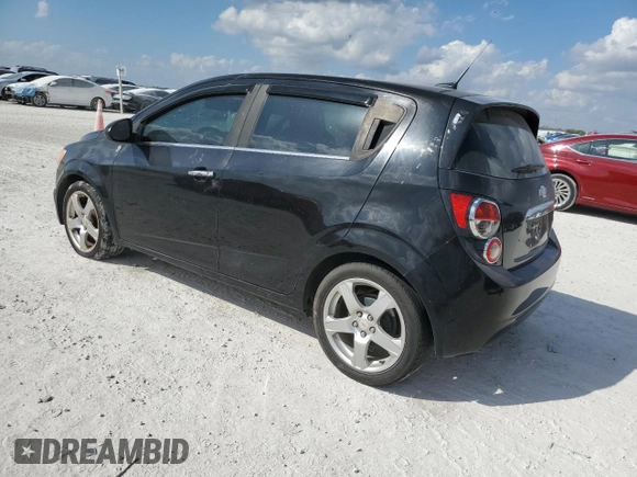2012 Chevrolet Sonic LTZ z VIN 1G1JE6SH9C4130554, wystawiony jako Copart lot #45020925 z przebiegiem 152 038 mil mil oraz Czysty tytuł • Clean title. Historia ofert i sprzedaży dostępna na DreamBid. Obrazek 2.