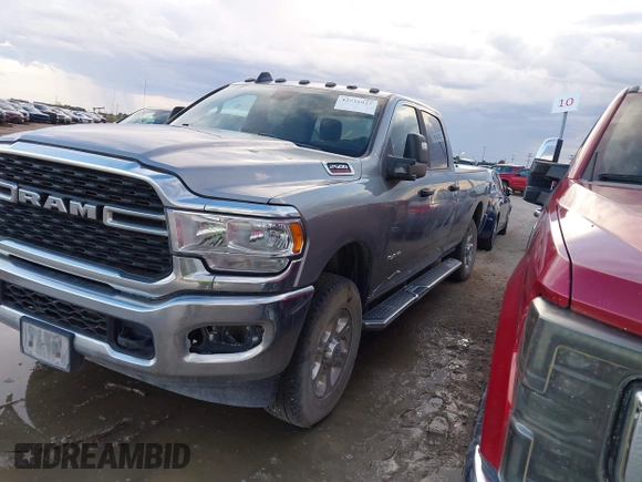 2023 Ram 2500 Lone Star with VIN 3C6UR5JJ7PG562101, listed as a IAAI auction lot 42731927 with 79,356 mi miles and . Bid and sale history available at DreamBid. Image 2.