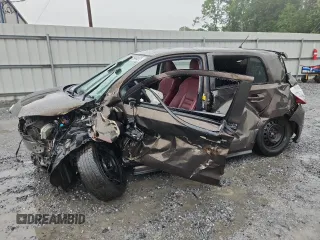 2011 Scion xD с VIN JTKKU4B45B1009691, выставлен на аукционе Copart как лот 59844575 с пробегом Не указан миль и Списание • Salvage title. История ставок и продаж доступна на DreamBid. Изображение 1.