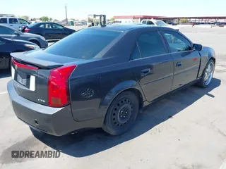 2005 Cadillac CTS with VIN 1G6DP567650227203, listed as a IAAI auction lot 42011203 with 151,683 mi miles. Bid and sale history available at carsss.com. Image 4.