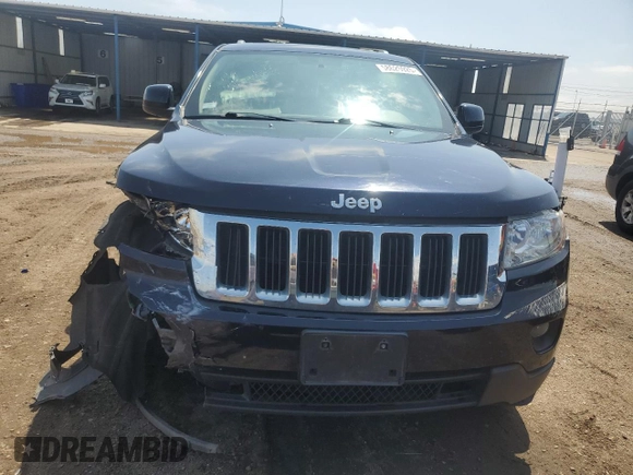 2011 Jeep Grand Cherokee Laredo with VIN 1J4RR4GG5BC703628, listed as a Copart auction lot 58626925 with 152,426 mi miles and Salvage title. Bid and sale history available at DreamBid. Image 5.