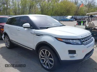 2015 Land Rover Range Rover Evoque Prestige z VIN SALVV2BG4FH076675, wystawiony jako IAAI lot #42138353 z przebiegiem 99 751 mil mil oraz . Historia ofert i sprzedaży dostępna na DreamBid. Obrazek 1.