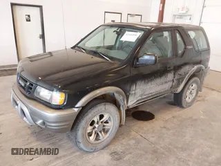 2002 Isuzu Rodeo z VIN 4S2CM57W124335034, wystawiony jako IAAI lot #42446556 z przebiegiem 214 718 mil mil oraz . Historia ofert i sprzedaży dostępna na DreamBid. Obrazek 2.