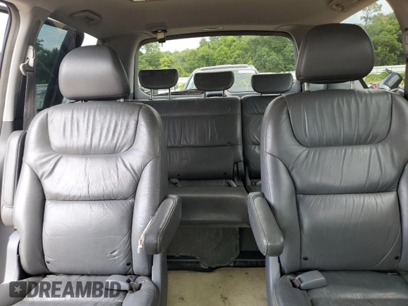 2006 Honda Odyssey EX-L z VIN 5FNRL387X6B458818, wystawiony jako Copart lot #61801335 z przebiegiem 227 179 mil mil oraz Czysty tytuł • Clean title. Historia ofert i sprzedaży dostępna na DreamBid. Obrazek 10.